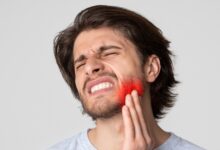 What are signs of a tooth infection?